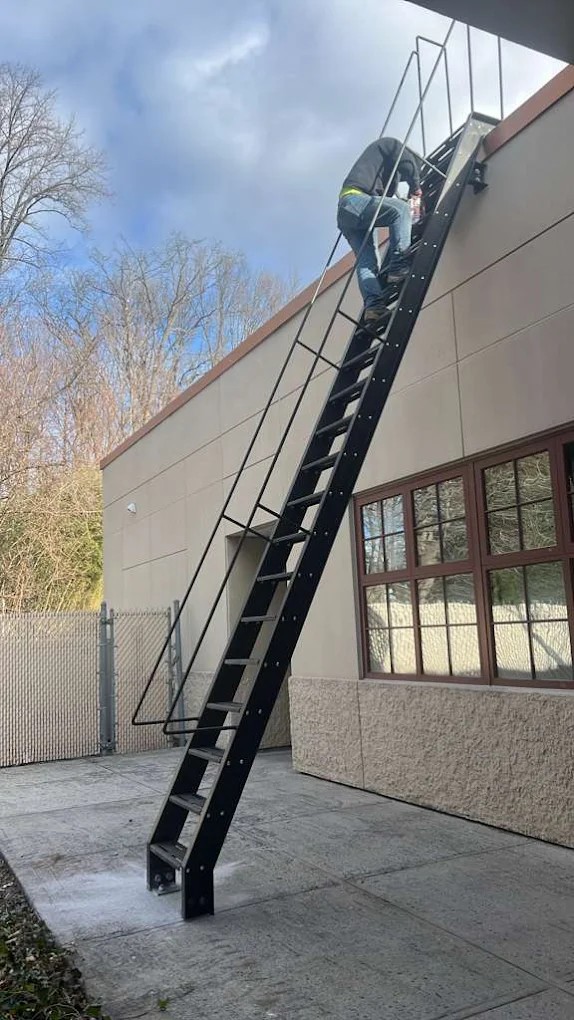 Custom steel railing installation by Steel Masters NYC in a renovated Brooklyn brownstone residential building